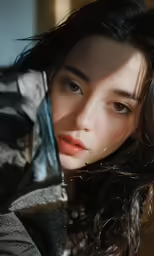 woman with black hair holding up her coat