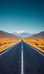 a long road with a white stripe on it