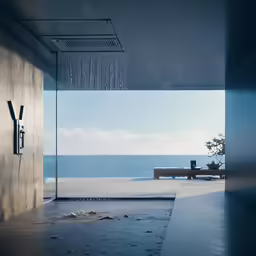 a bathroom with a very big window over looking the ocean