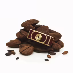 a pile of walnuts is displayed with an antique lens
