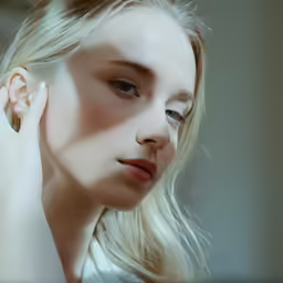 a woman is shown with her ear in place