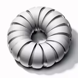 the donut pillow is shaped like a curled stripe