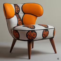 an orange and black patterned chair sitting on top of a white table