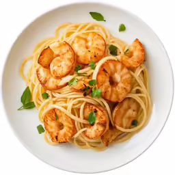 a white plate with shrimp and linguinas