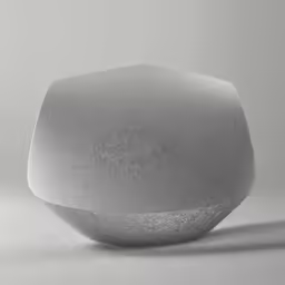 a grey colored vase sits in the center of the room