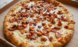 there is a pizza with toppings on it