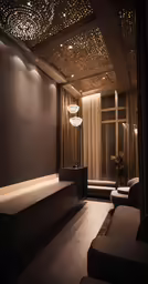a living room with a couch and light fixtures