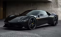 the black sports car is parked in front of a building