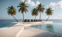 lounge chairs line the edge of an empty swimming pool