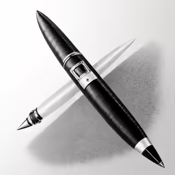 an open black and white pen on a piece of paper