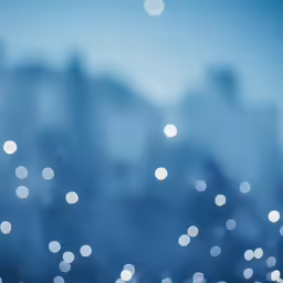blurry blue cityscape shows white light
