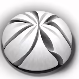 a round black and white object on a wall