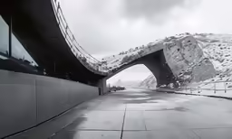 an overpass near an intersection in the winter