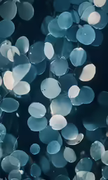 abstract blurry background with bright blue bubbles