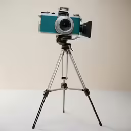 an old fashion camera is set up on a tripod