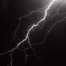 a photo that is taken from ground at night shows a very blurry lightning scene with streaks of light
