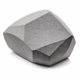 a large, cement sculpture on a white background