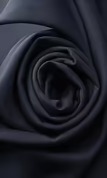 the side of a black silk fabric