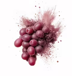 grapes are splashed in front of a white background