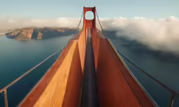a long wooden bridge next to some water