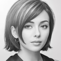 a woman with a black shirt and necklace is posing