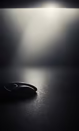 a wireless mouse sitting on top of a desk