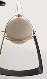 a light fixture is hanging from a ceiling fixture