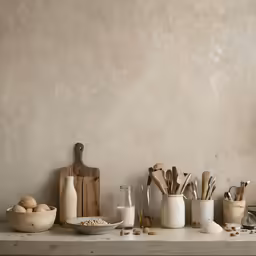 there is a shelf that has bowls of cereal on it