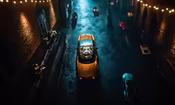 many small cars and some light up lights are on