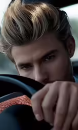 a guy that is sitting in a car holding a steering wheel