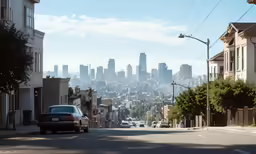 a street lined with tall buildings and lots of traffic