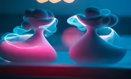 two small vases with colorful light and shadows