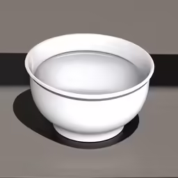 a white bowl on a table in the middle of it