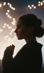 a woman with a dark jacket and white fireworks