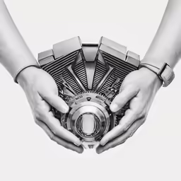 hands holding the wheel of an airplane engine