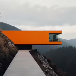 a long concrete pathway going to the top of a mountain