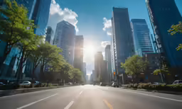 a view of a street with lots of tall buildings on both sides
