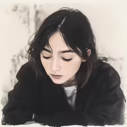 an asian woman with dark hair and a black coat