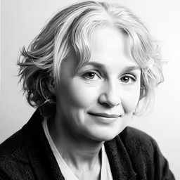 a black and white photo of a woman with a curly wig