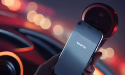 an image of a man holding a cell phone