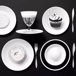 various plates and cups with spoons, utensils, spoon and a wine glass on a black surface