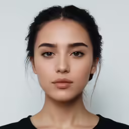 an image of a woman with makeup and dark hair
