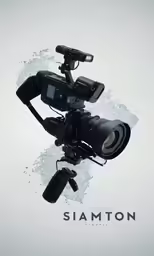 a camera on top of a tripod in front of a wall