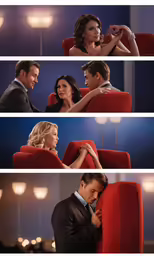 people sitting down watching a movie on red chairs