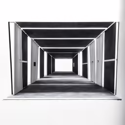 an empty walkway leading to another building with windows