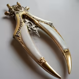 gold and white brooch with skeleton accents and cross