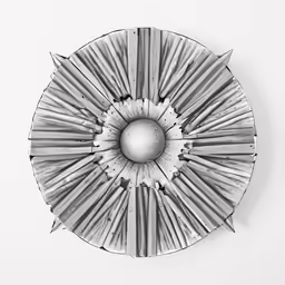 the bottom half of a metal plate that has been made into a sculpture
