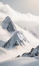 some snow skiers on the snowy mountain top