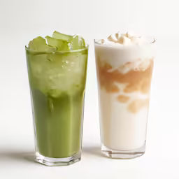 three beverages sitting side by side in front of a white background