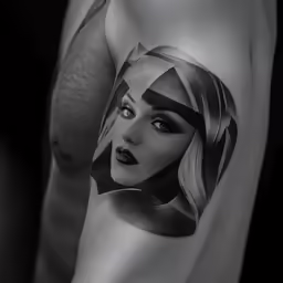 the cover up to an abstract tattoo of a woman with a gun on her arm